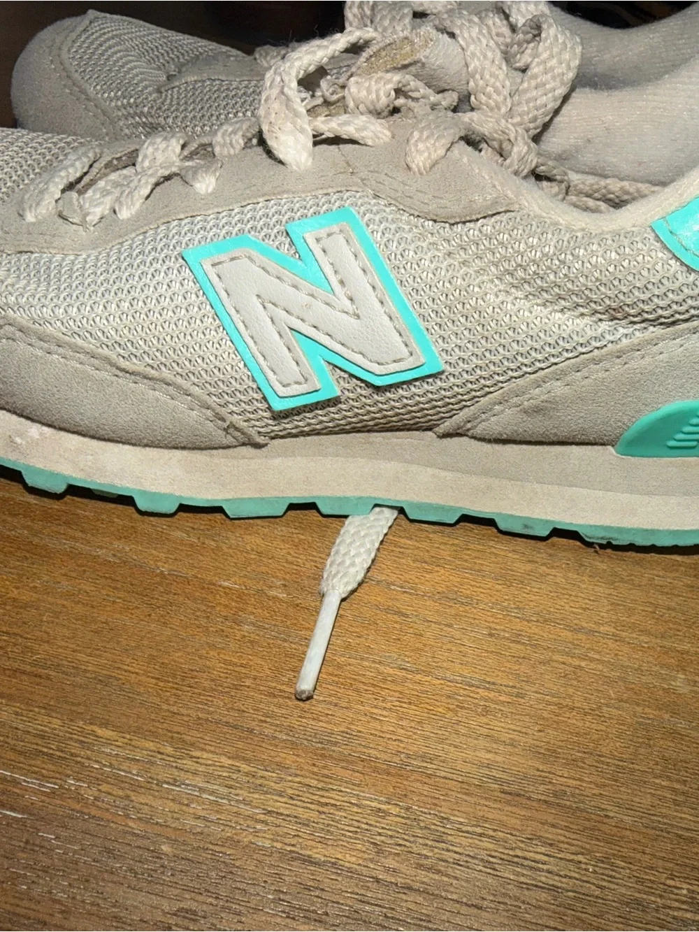 New Balance Women's Beige Sneakers with Teal Accent